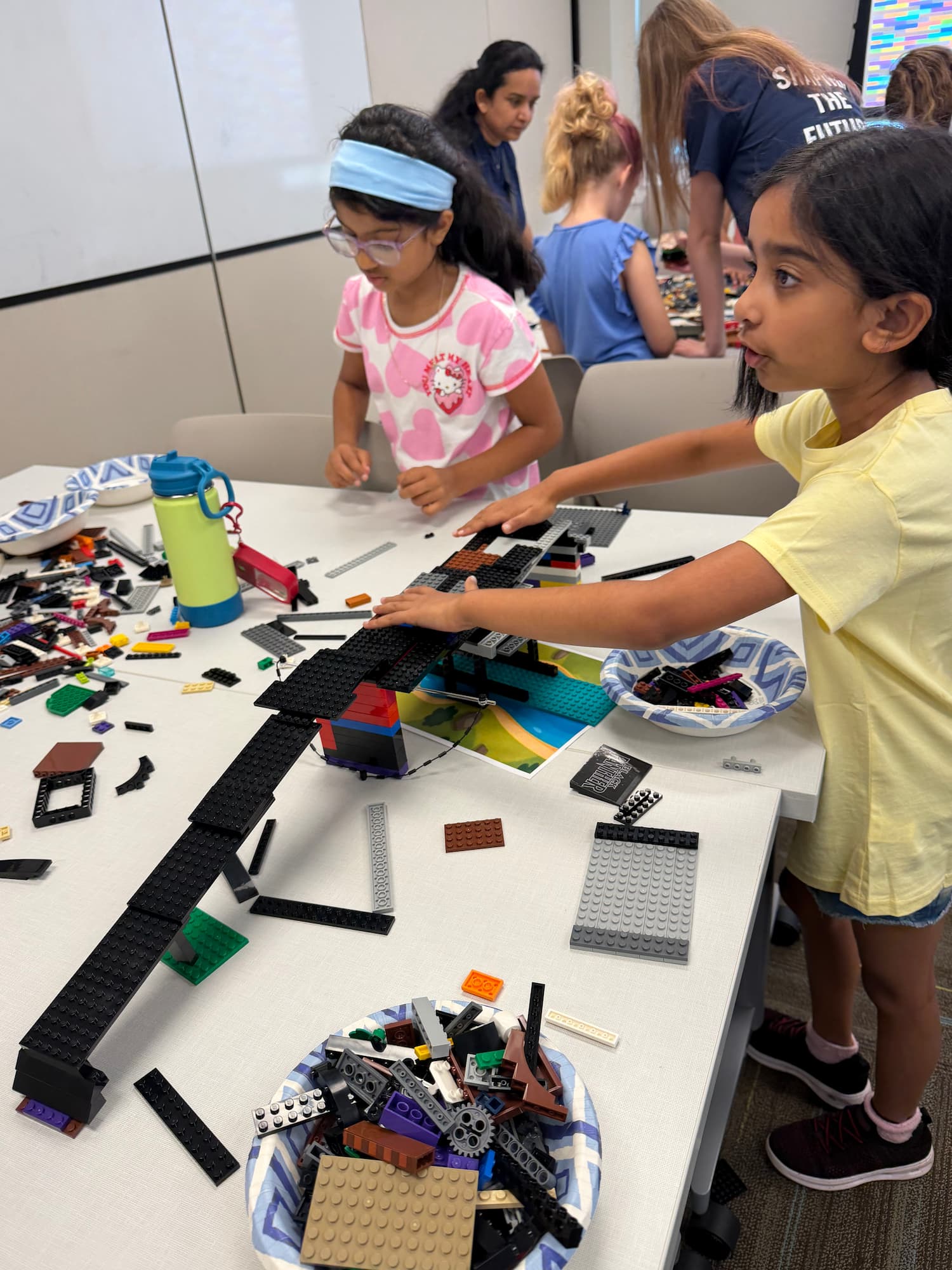 Kids attaching deck — LEGO Bridge Building Workshop